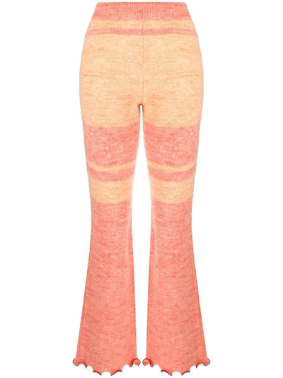 Shop Andersson Bell Striped Knitted Flared Trousers In Rosa