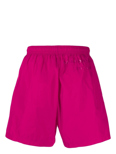 Shop Alexander Mcqueen Logo-print Swim Shorts In Rosa