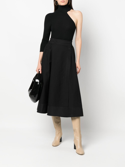 Shop Khaite Side-buttoned A-line Skirt In Schwarz