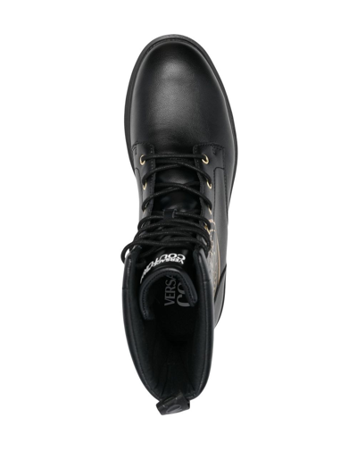 VERSACE JEANS COUTURE LOGO-PRINT LEATHER COMBAT BOOTS 