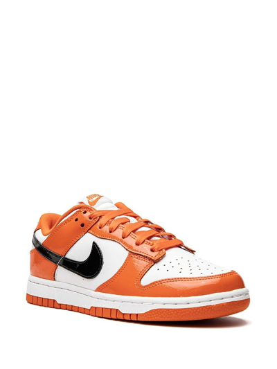 Shop Nike Dunk Low "orange/black Patent Leather" Sneakers