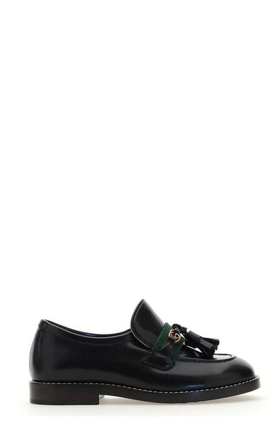 Shop Gucci Round Toe Slip-on Loafers In Black