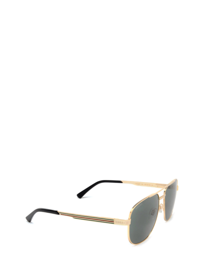 Shop Gucci Gg1223s Gold Sunglasses