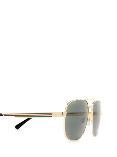 Shop Gucci Gg1223s Gold Sunglasses
