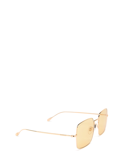 Shop Gucci Gg1184s Gold Sunglasses