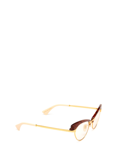 Shop Gucci Gg1131s Gold Sunglasses