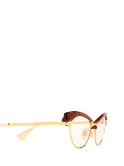 Shop Gucci Gg1131s Gold Sunglasses