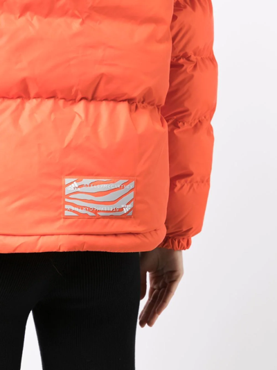 Shop Adidas By Stella Mccartney Padded Performance Jacket In Orange