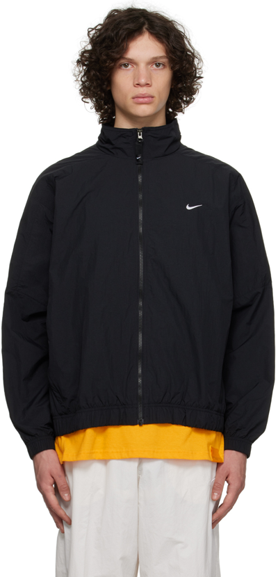 Nike logo woven track jacket in black