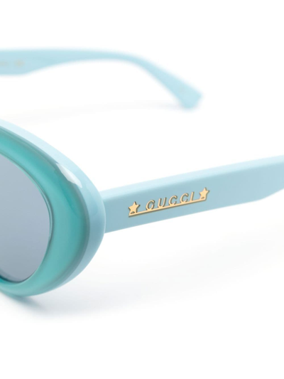 Shop Gucci Cat-eye Frame Tinted Sunglasses In Blue