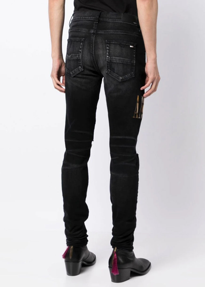 Shop Amiri Aged Black Flannel Core Logo Jeans