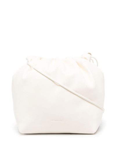 Shop Jil Sander Drawstring-fastening Shoulder Bag In White