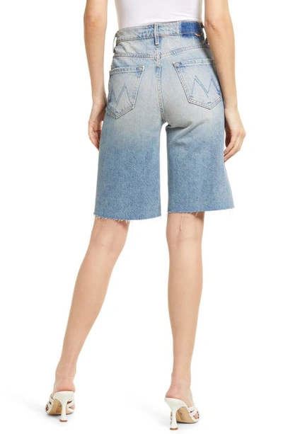 Shop Mother The Undercover Frayed Knee Length Denim Shorts In The Other Side