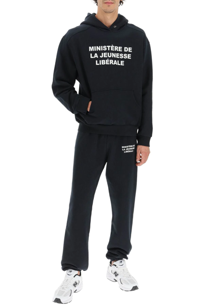 Shop Liberal Youth Ministry Lettering Print Cotton Sweatpants In Black