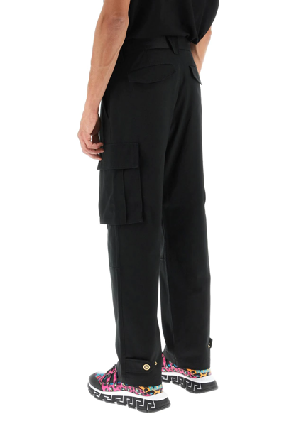 Shop Versace Cotton Cargo Pants In Black