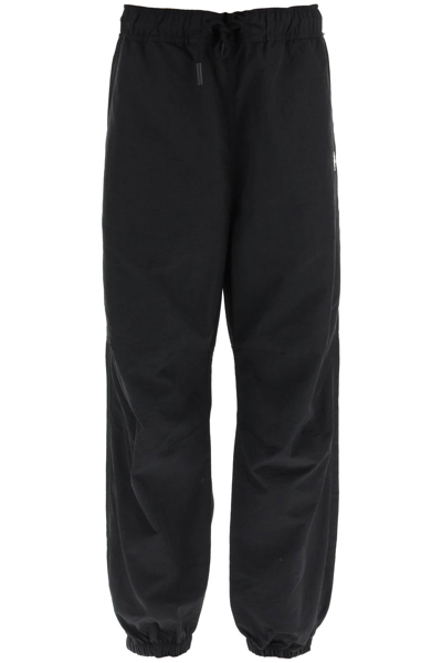 Shop Marcelo Burlon County Of Milan Cross Nylon Track Pants In Black