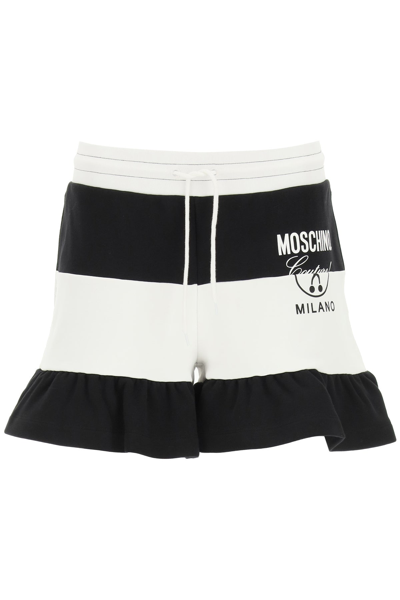 Shop Moschino Striped Shorts With Logo Print In Multicolor