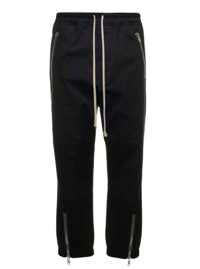Shop Rick Owens Man's Black Cotton Track Pants  With Zip