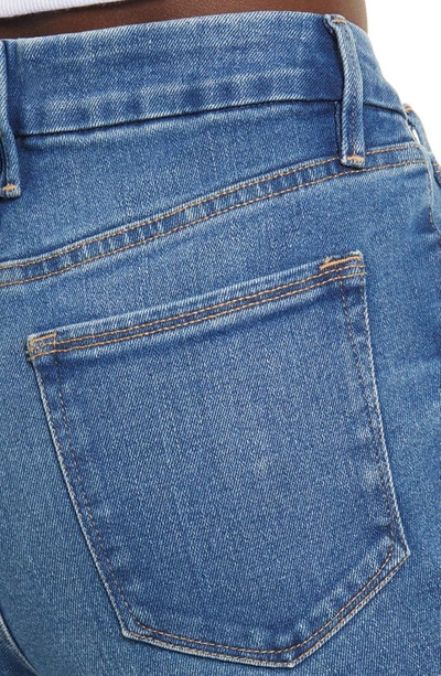 Shop Good American Good Legs Flare Split Hem Jeans In Indigo029
