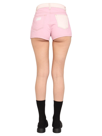 Shop Ganni Denim Shorts In Pink