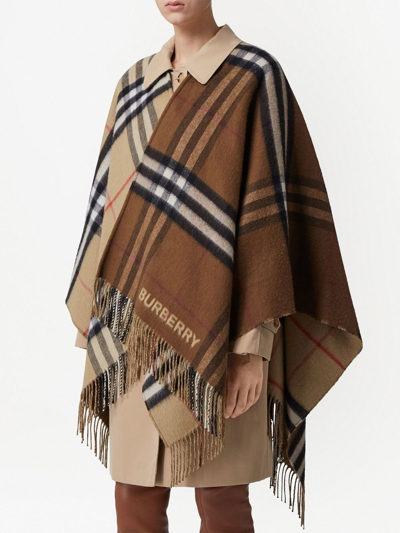 Shop Burberry Contrast Check Fringed Cape In Braun