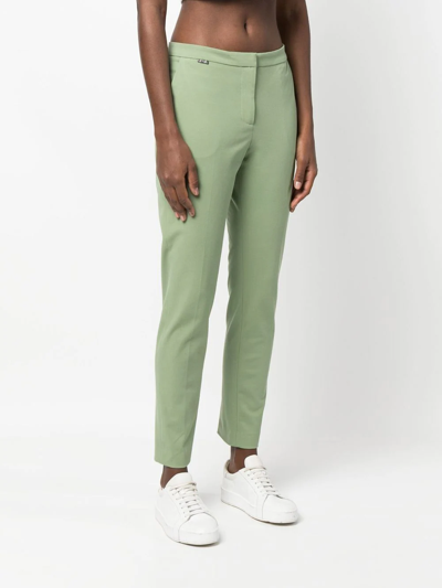 Shop Le Tricot Perugia Low-rise Tapered Trousers In Grün