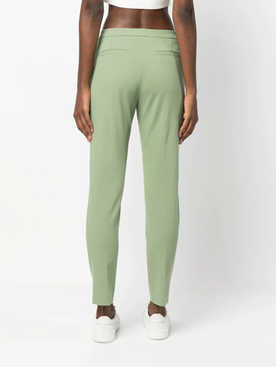 Shop Le Tricot Perugia Low-rise Tapered Trousers In Grün