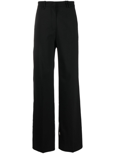 Shop Jacquemus Tapered-leg Trousers In Schwarz