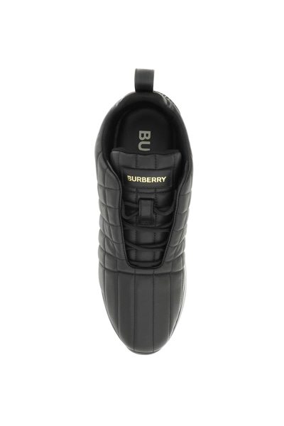 Shop Burberry Quilted Leather Sneakers In Black
