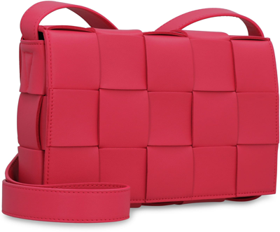 Shop Bottega Veneta Cassette Leather Crossbody Bag In Red