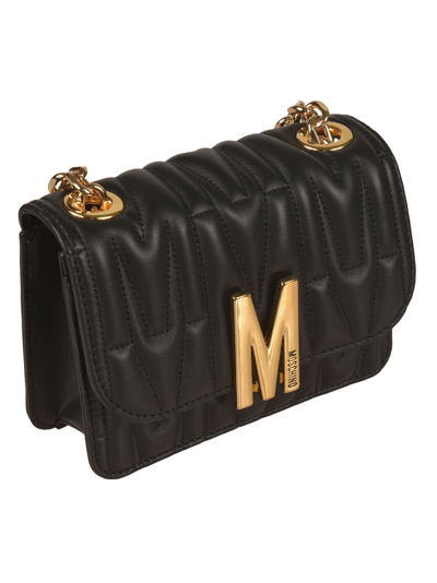 Shop Moschino Chain Strap Quilted Shoulder Bag In 1555