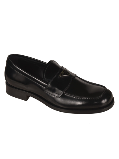 Shop Prada Low Top Loafers In Nero