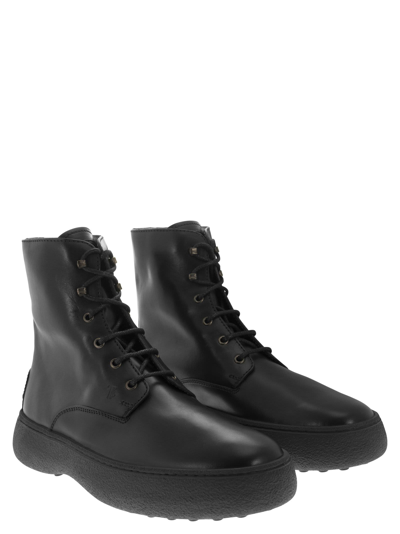 Shop Tod's Leather Lace-up Boot In Black