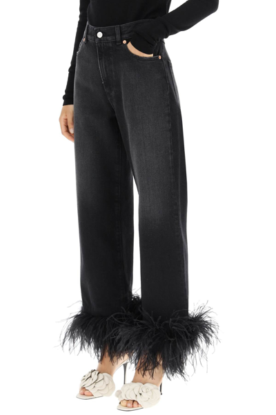 Shop Valentino Straight Jeans With Feathers In Black
