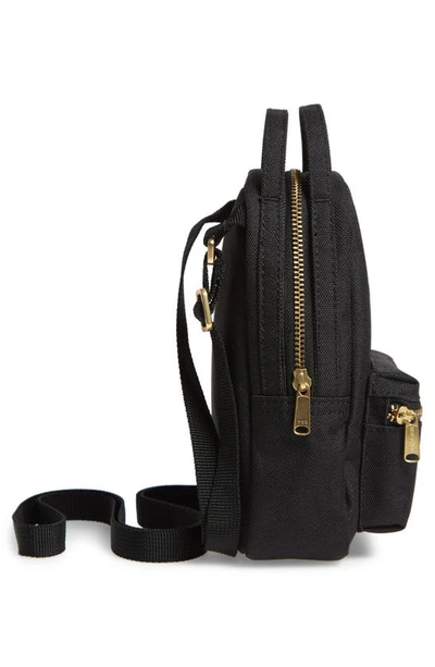 Shop Herschel Supply Co Nova Crossbody Backpack In Black