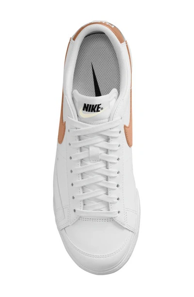 Shop Nike Blazer Low Platform Sneaker In White/ Metallic/ Copper/ Black