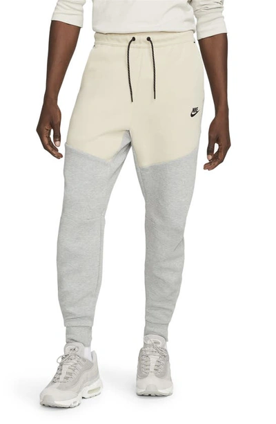 Shop Nike Tech Fleece Jogger Sweatpants In Dark Grey/ Rattan/ Black