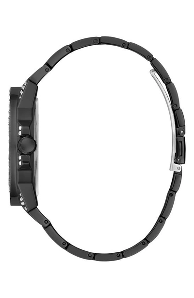 Shop Guess Multifunction Crystal Skeleton Matte Black Bracelet Watch, 44mm In Black/black/black