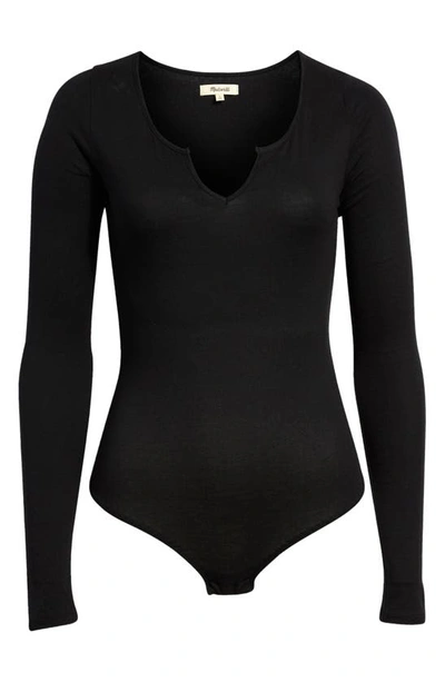 Shop Madewell Pointelle Split Neck Long Sleeve Thong Bodysuit In True Black