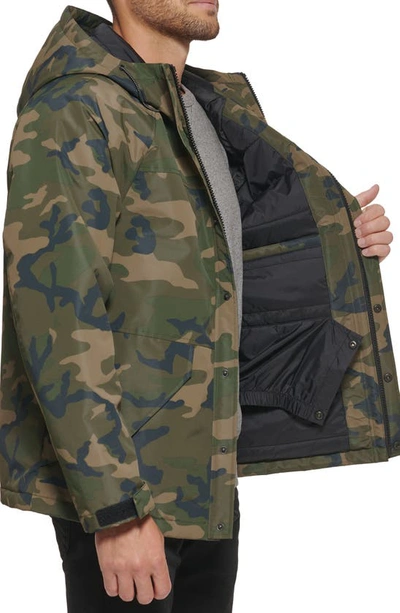 Shop Levi's Performance Storm Rain Jacket In Camouflage