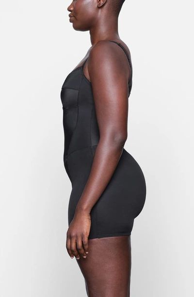 Skims Glam Short Bodysuit In Onyx