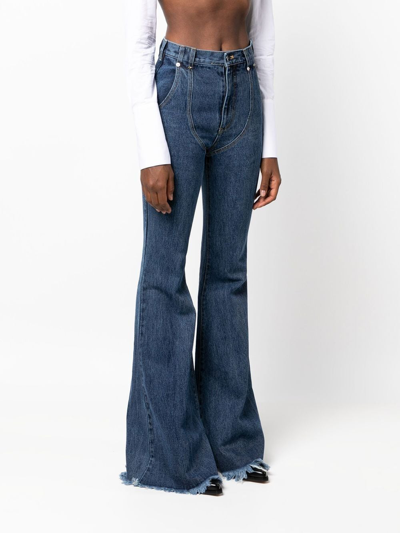 Shop Juneyen Mid-rise Flared Jeans In Blau