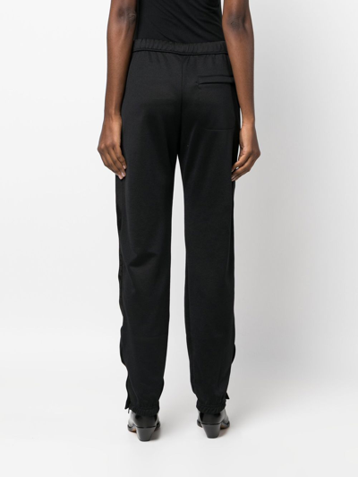 Heron Preston Logo Patch Ruched-ankle Trousers In Schwarz