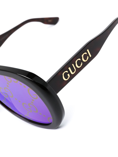 Shop Gucci Gg Logo-print Oversized Sunglasses In Braun