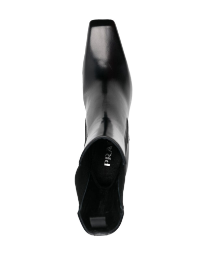 Prada Streamlined Leather Ankle Boots With Pointed Toe In Black