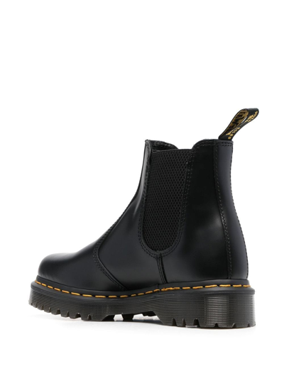 Dr. Martens' Leather Round-toe Boots In Schwarz