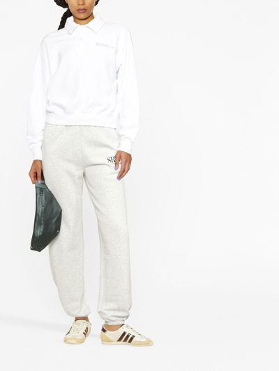 Sporty And Rich Logo-print Long-sleeved Polo Top In Weiss