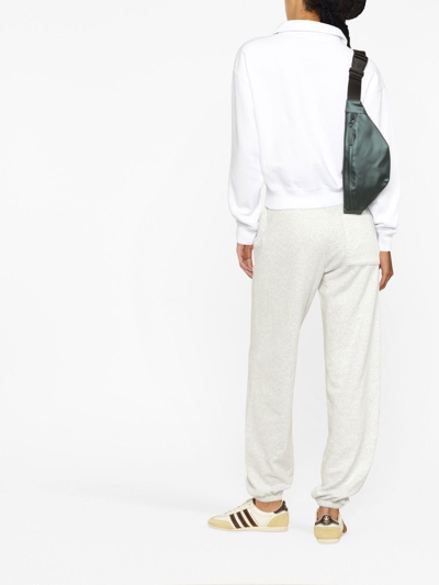 Sporty And Rich Logo-print Long-sleeved Polo Top In Weiss