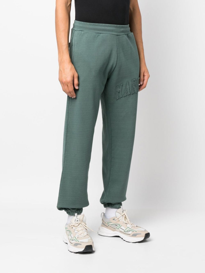 Shop Market Logo-patch Washed Track Pants In Grün