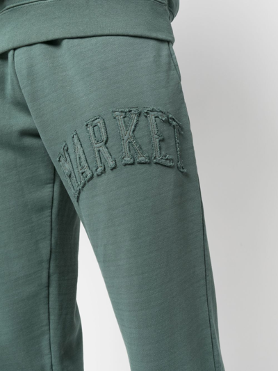 Shop Market Logo-patch Washed Track Pants In Grün